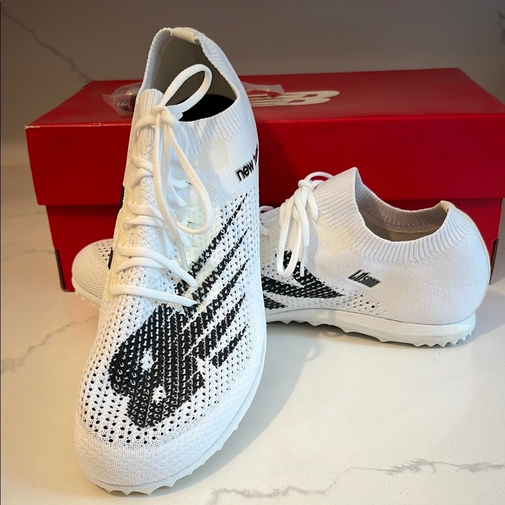New Balance White and Black track spikes
